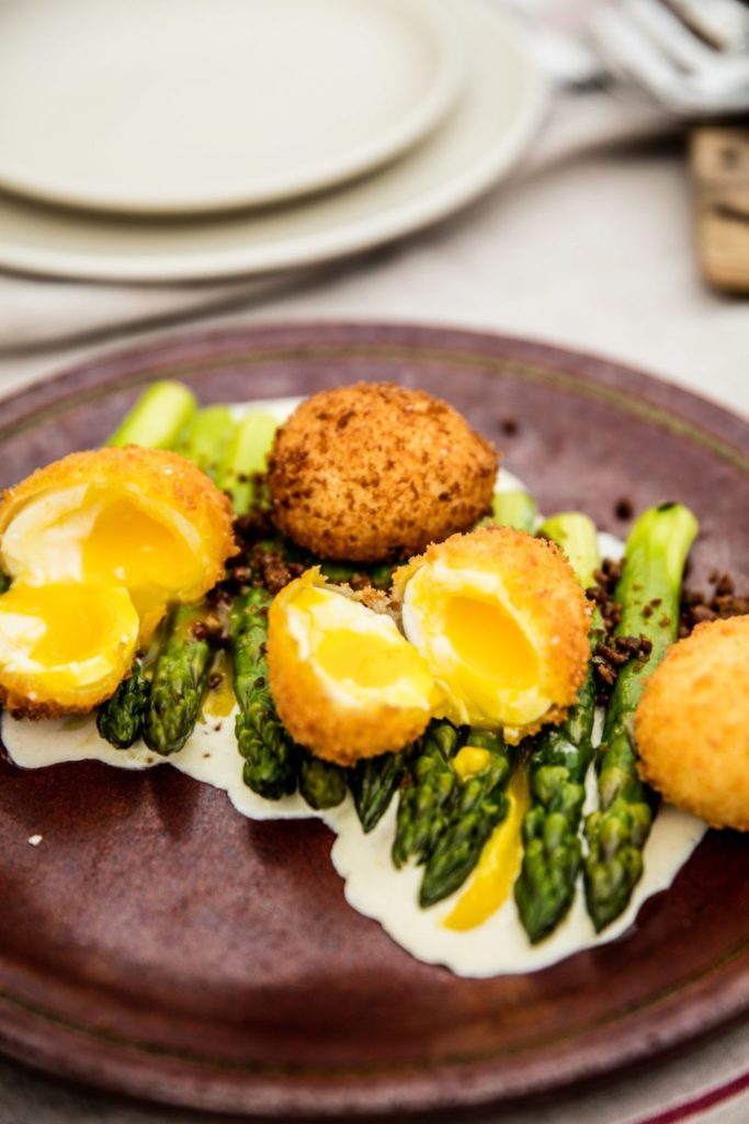 Gluten-Free Crispy Soft-Boiled Eggs and Olive Oil– Poached Asparagus with Cambozola Crema